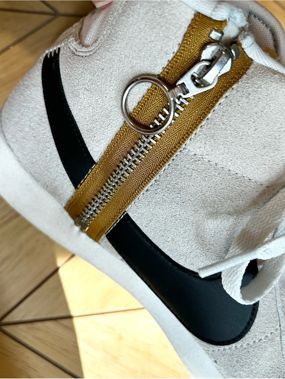 Nike Mid-Top Suede Sneakers in Light Gray with Black Swoosh and Tan Zipper